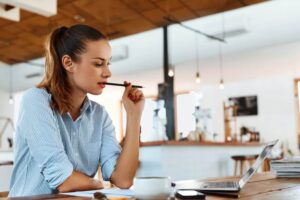 woman writing a blog