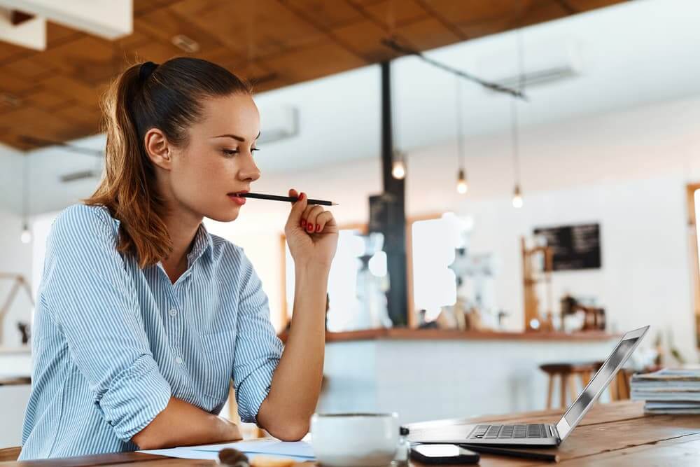 woman writing a blog