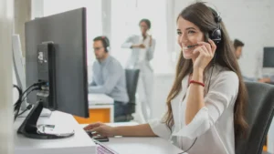 woman who works for one of the best outsourced medical records retrieval company happy speaking to a customer