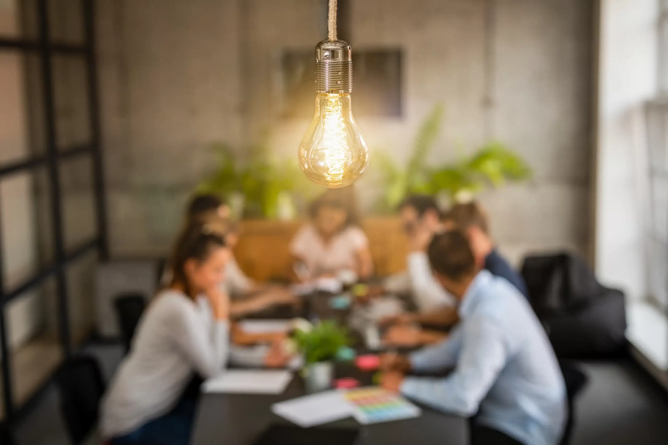 business owners in a meeting discussing bpo outsourcing for startups