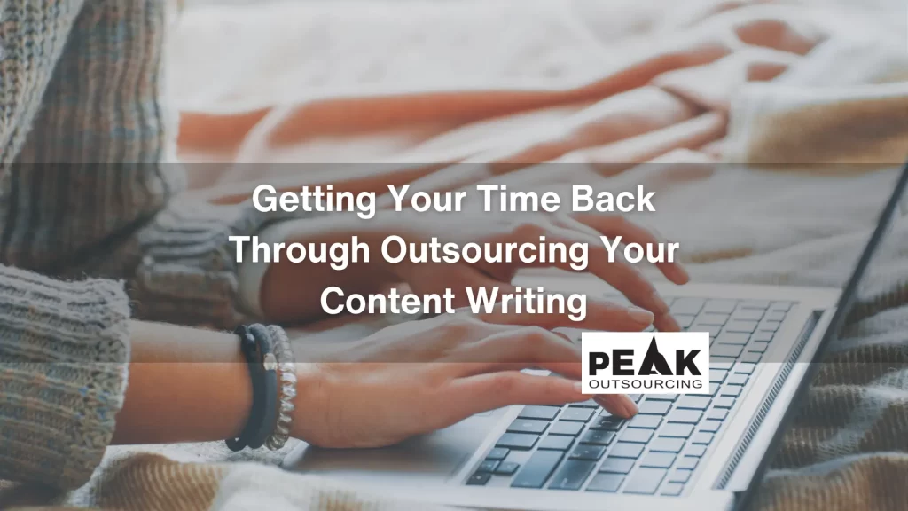 getting your time back through outsourcing your content writing, writer's hands typing while working on an outsourced blog article