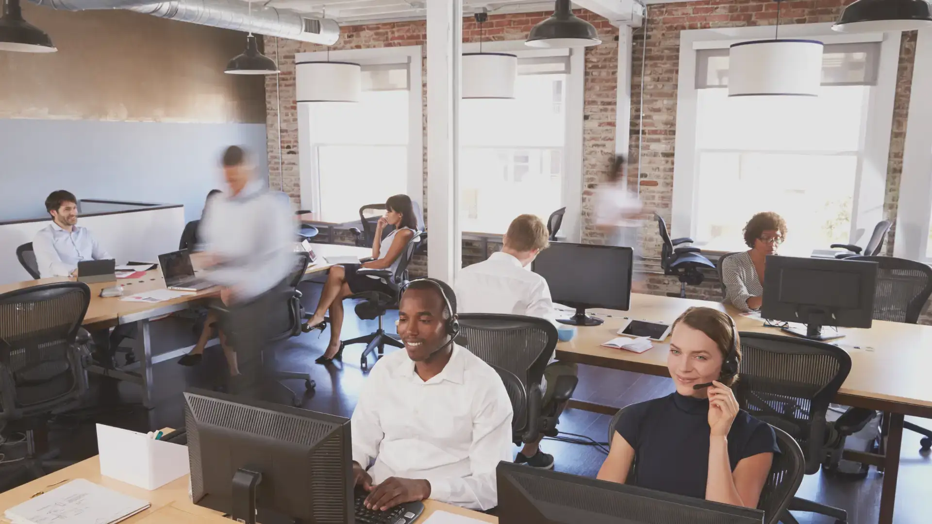 a group of social media virtual assistants from a bpo company working on social media marketing tasks