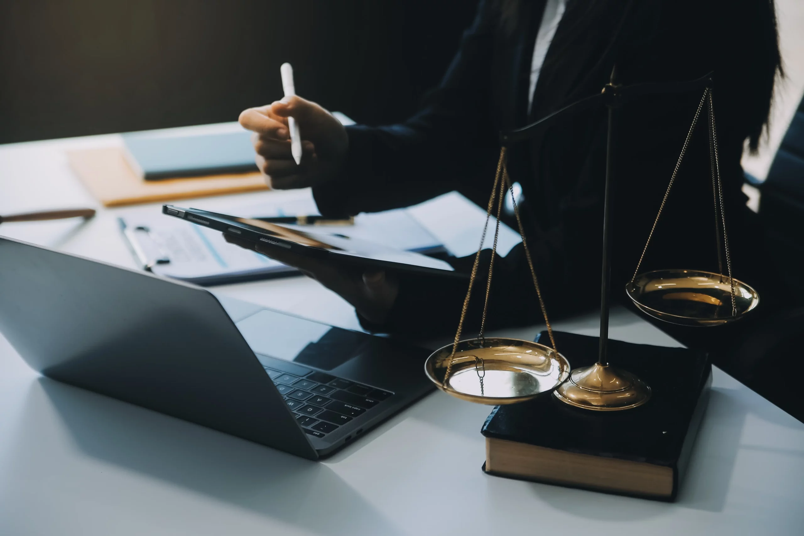 a hardworking lawyer contemplating how to improve law firm efficiency