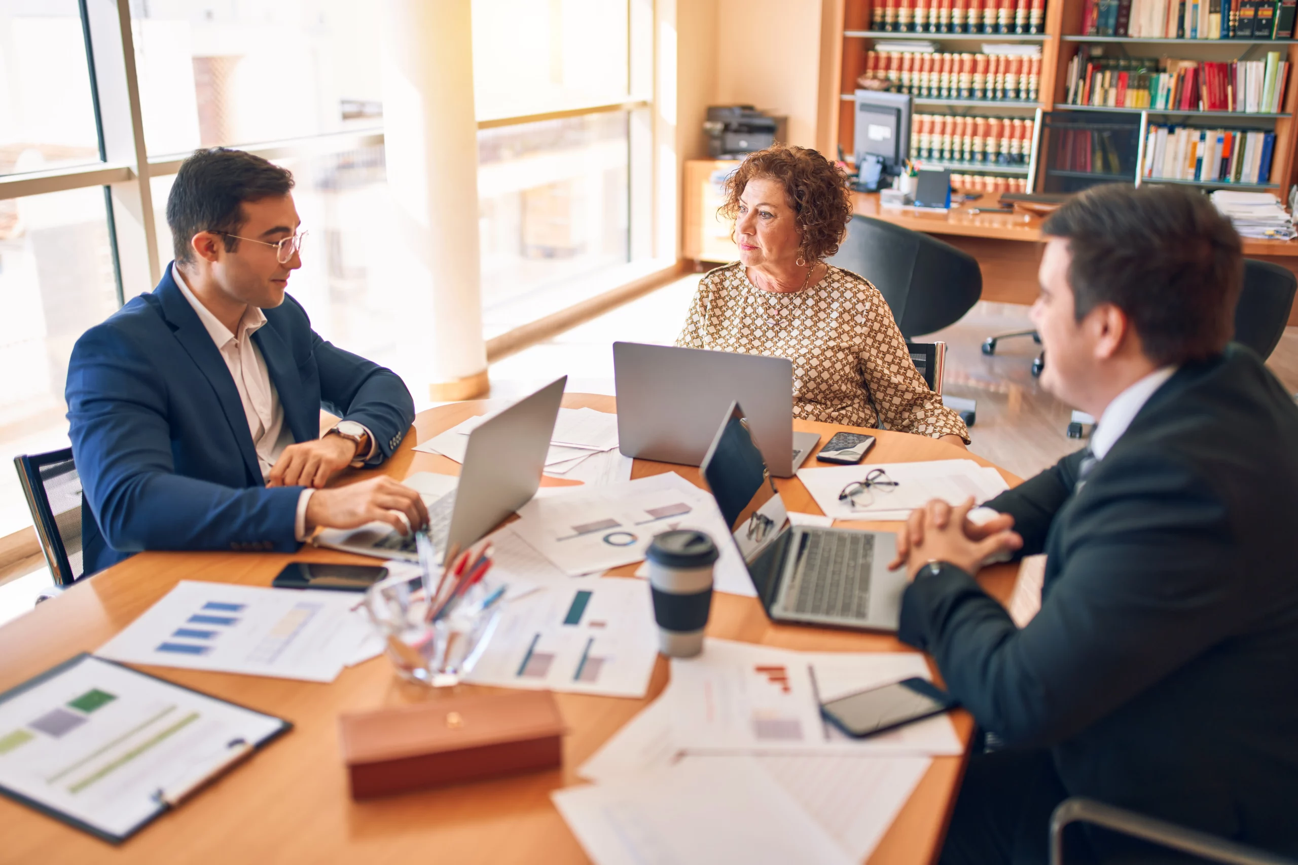 staff from a law firm discussing outsourcing of their legal services