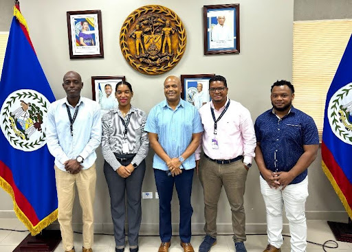 Representatives from Peak Outsourcing International BLZ LTD. and Belize City Council signing a memorandum of understanding