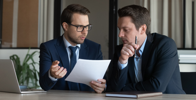 lawyer speaking to another lawyer about legal processing