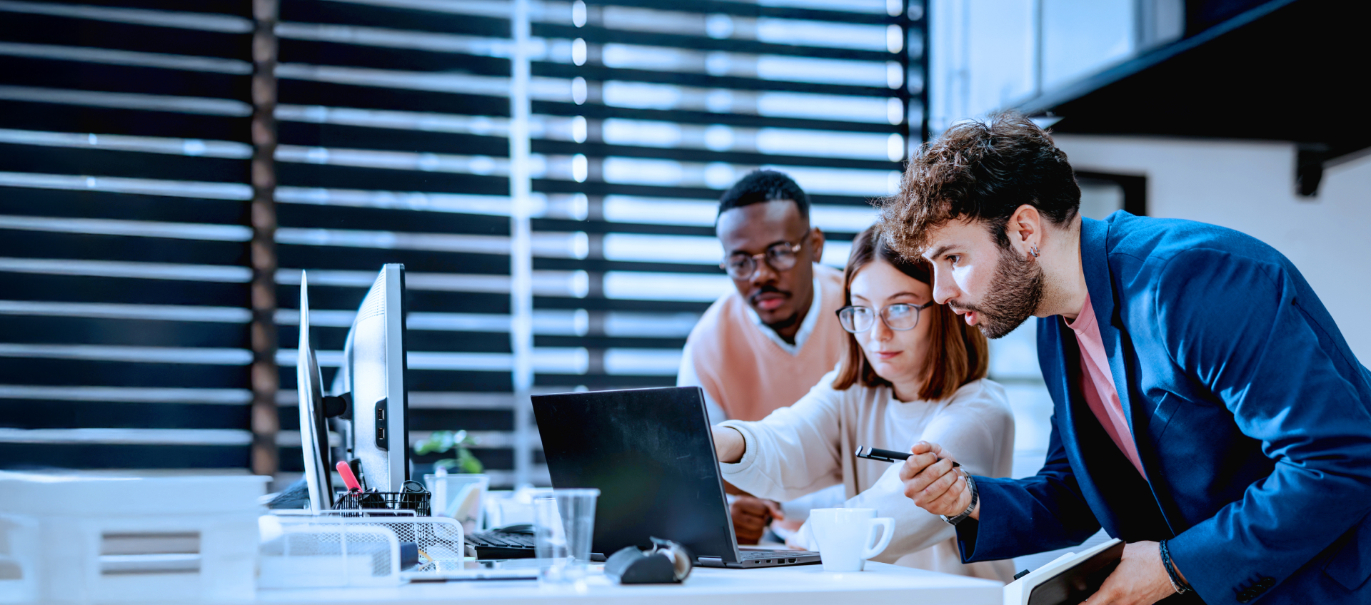 three colleagues working together