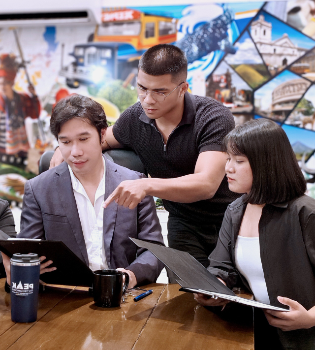 Three colleagues discussing