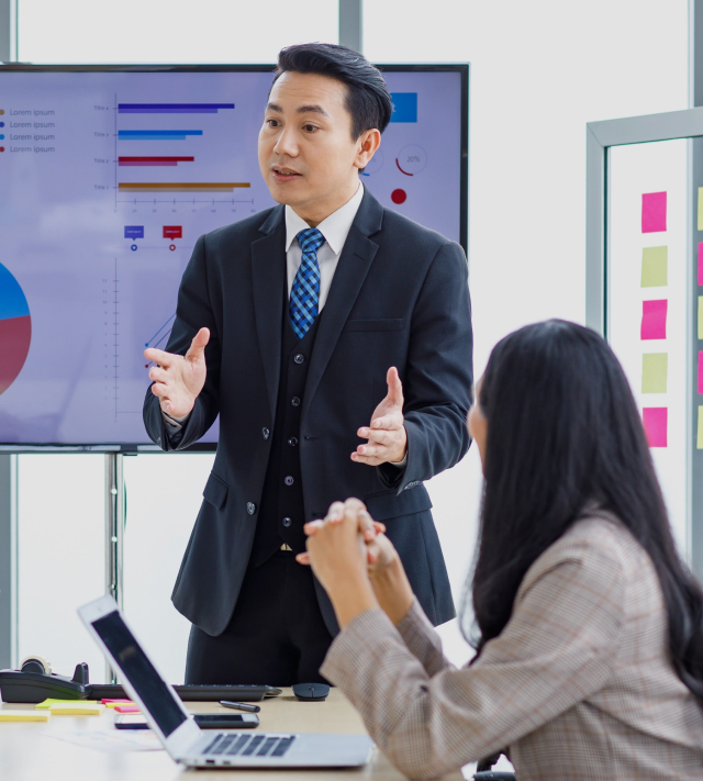 A professional talking in a meeting