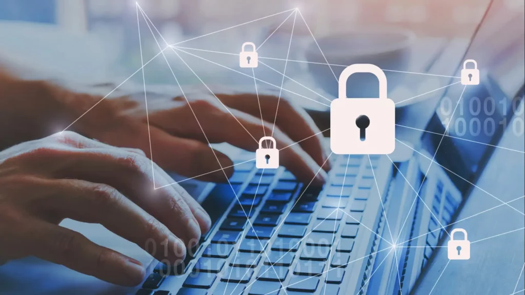 Hands typing on a keyboard with digital lock icons, representing cybersecurity.