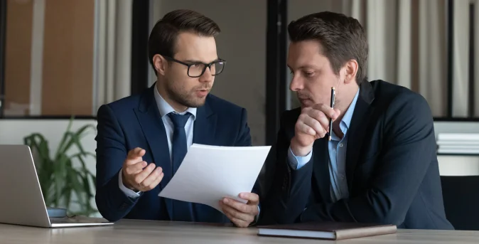 lawyer speaking to another lawyer about legal processing