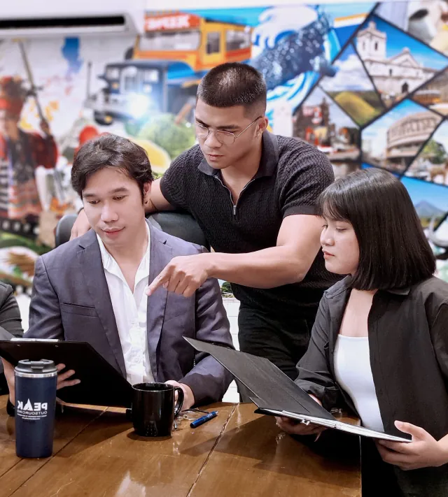 Three colleagues discussing